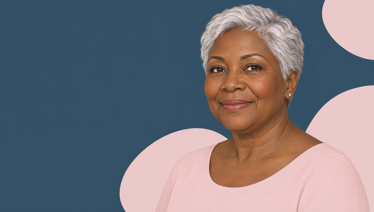 Illustration of a smiling woman in her sixties with deep brown skin and short silver hair, with a softened jawline and gently loosened lower cheeks.