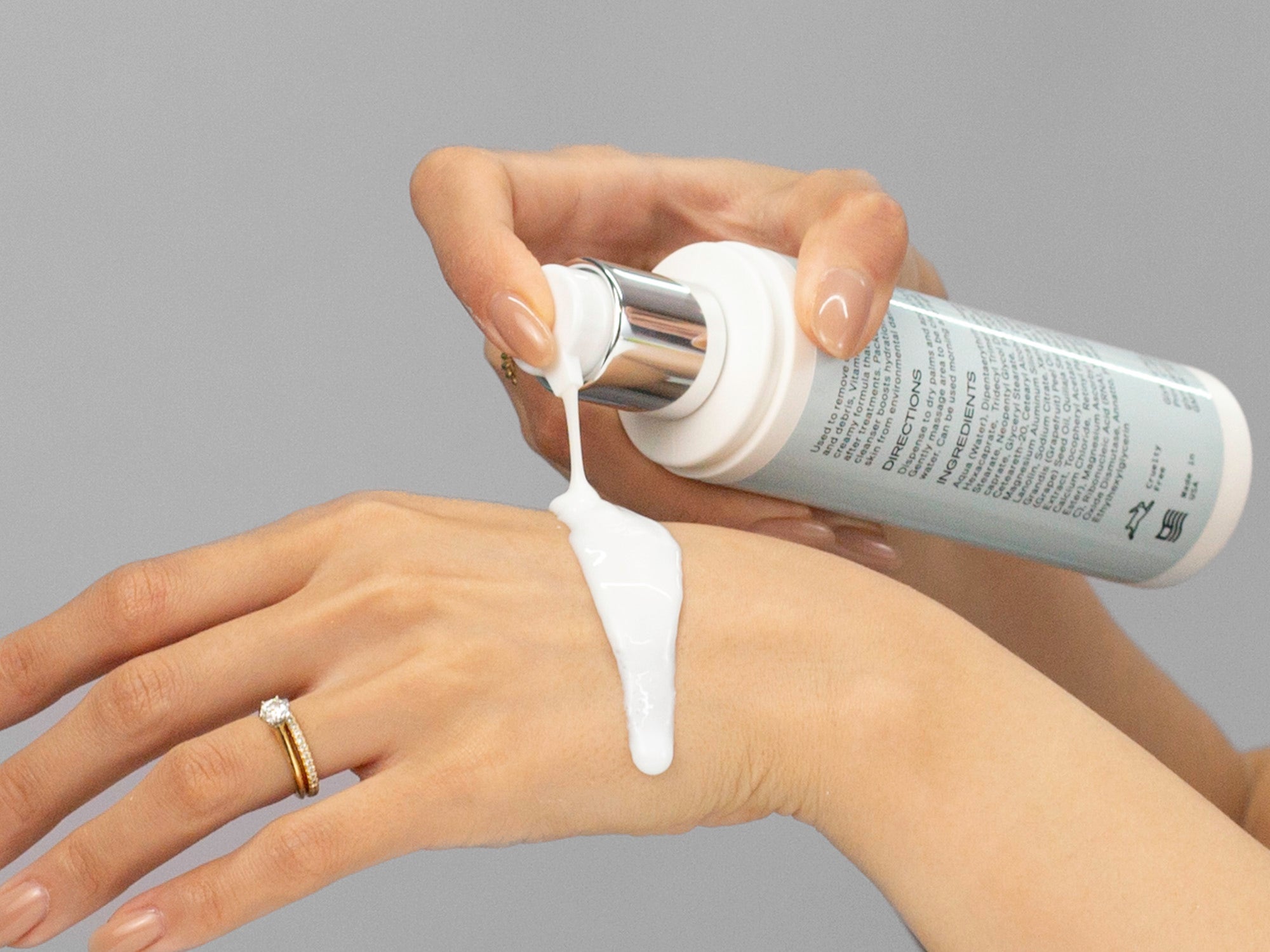 Closeup of Laziza from LAZ Skincare applying GlyMed Vitamin C Cleanser to her hand