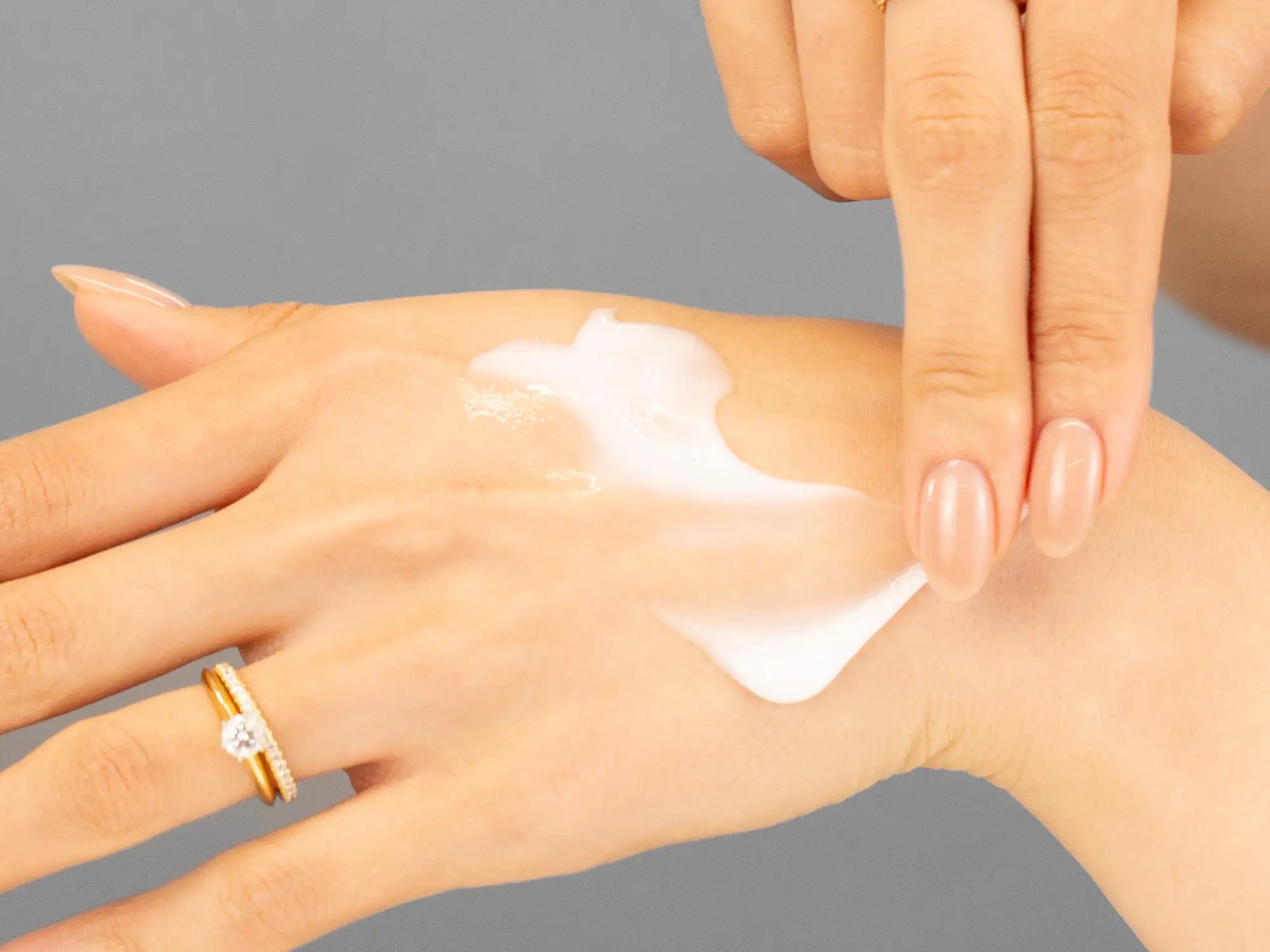 Laziza from LAZ Skincare demonstrating the texture and application of Marini SkinSolutions Bioglycolic Face Cleanser on her hand