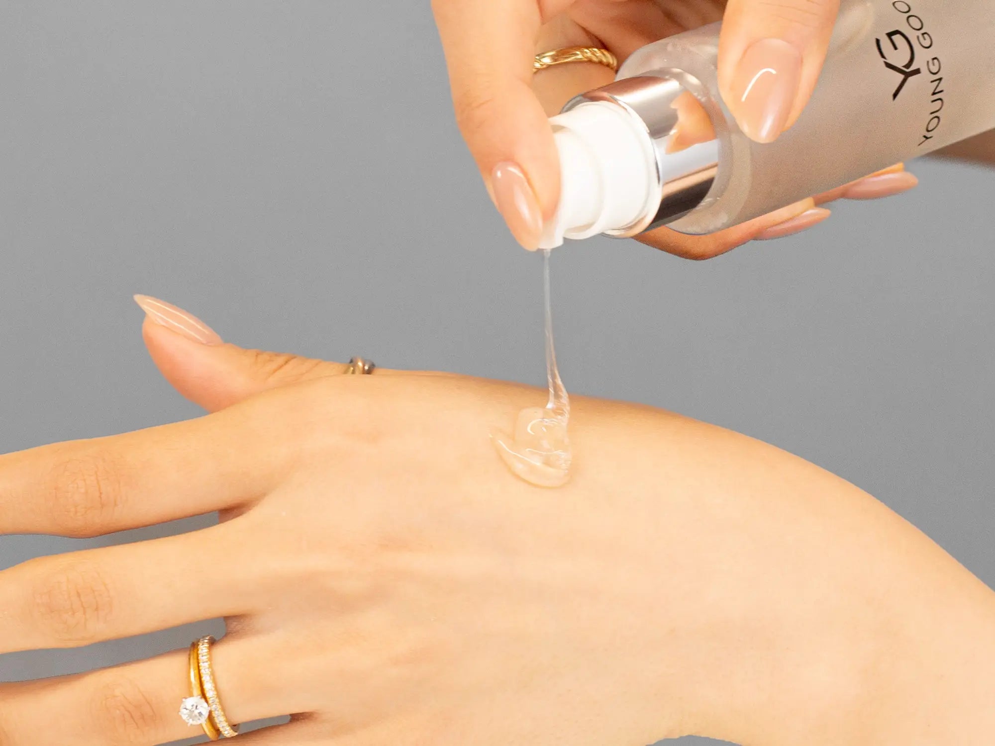 Laziza from LAZ Skincare demonstrating the texture and application of Young Goose Adaptogenic Cleanser on her hand