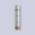 Alastin A-Luminate Brightening Serum bottle on a light purple background