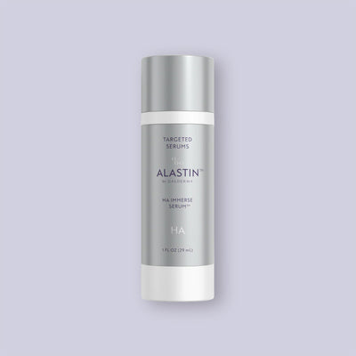Silver Alastin HA Immerse Serum bottle on a light purple background