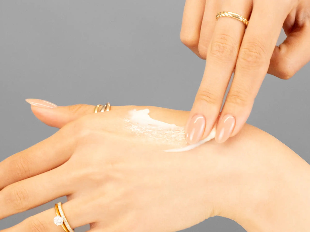 Laziza from LAZ Skincare demonstrating the texture and application of Marini SkinSolutions Retinol Plus on her hand