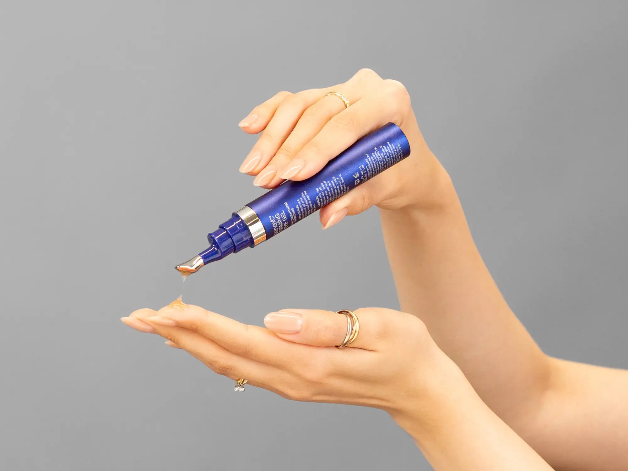 Laziza from LAZ Skincare demonstrating the texture and application of iS Clinical GeneXC Firming Eye Gel on her hand